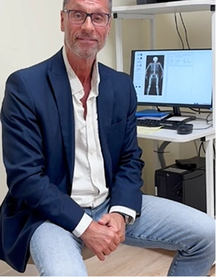 Physician standing in medical office