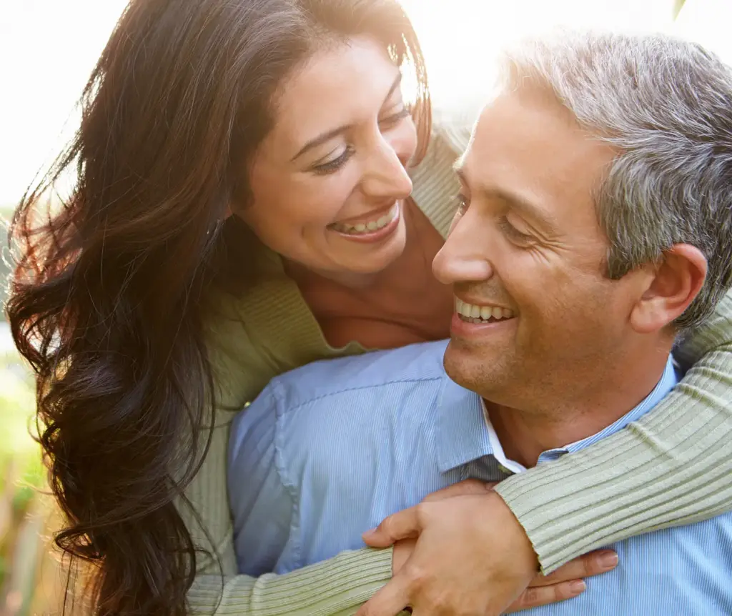 Happy couple benefiting from hormone balance treatment in Jericho, NY