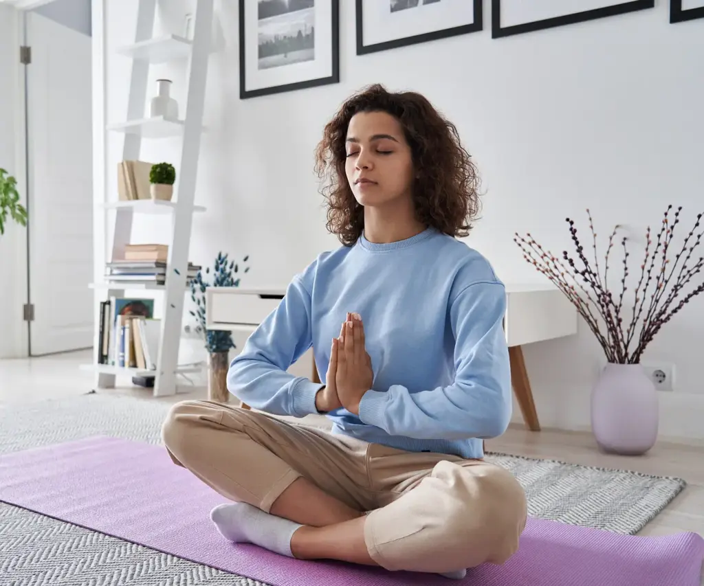 Woman practicing healthy lifestyle at home | Wellness Expert in Jericho, NY | Restoration Health 365