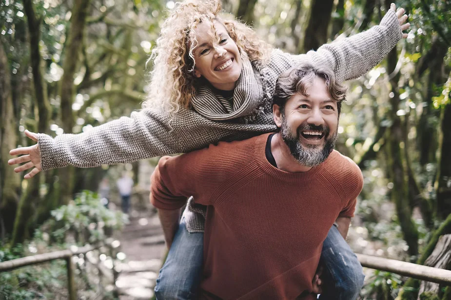 Happy couple enjoying healthy lifestyle together | Restoration Health 365 in Jericho NY
