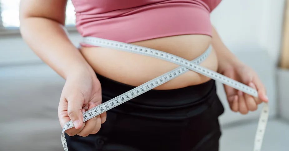 Measuring tape around waist for medical weight loss | Restoration Health 365 in Jericho NY